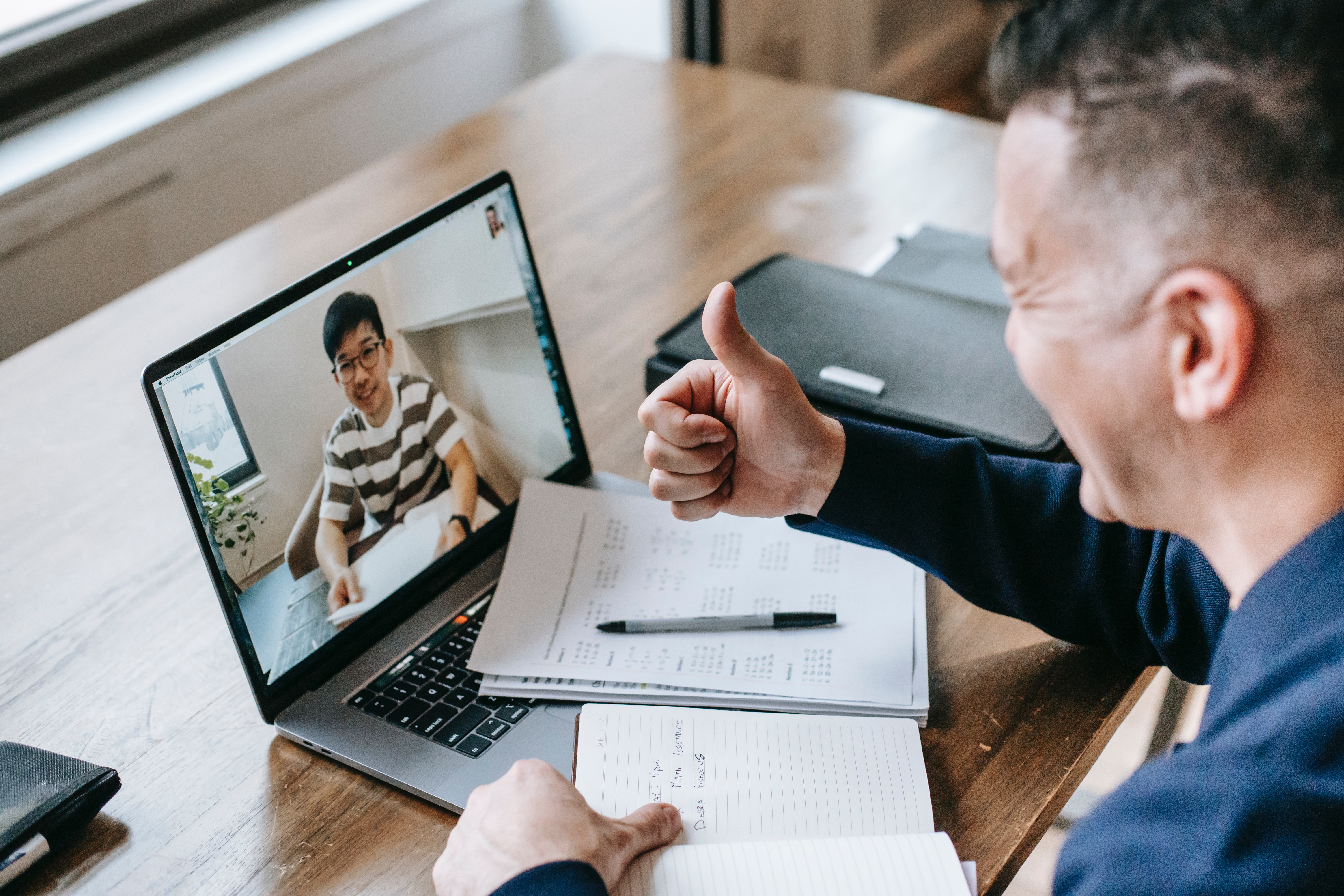 Индивидуальные фотографии. Person with documents. Finding a Remote job. Working Virtue. Man gestures during Virtual meeting.